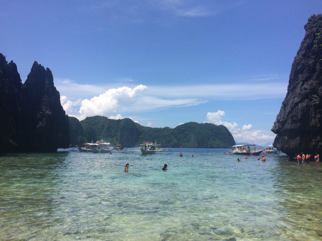Island-hopping boats docked in front of the Small Lagoon in El Nido