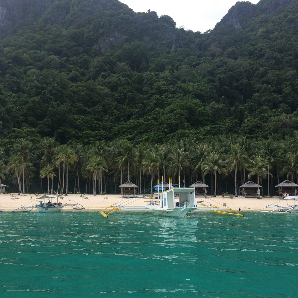 Tourist boats docked in Seven Commandos Beach